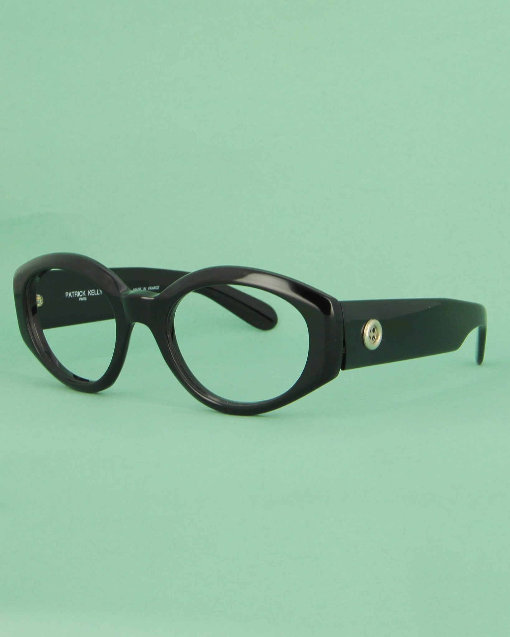patrick-kelly-papaye-lunettes-de-soleil-ovales-noires-boutons image 3