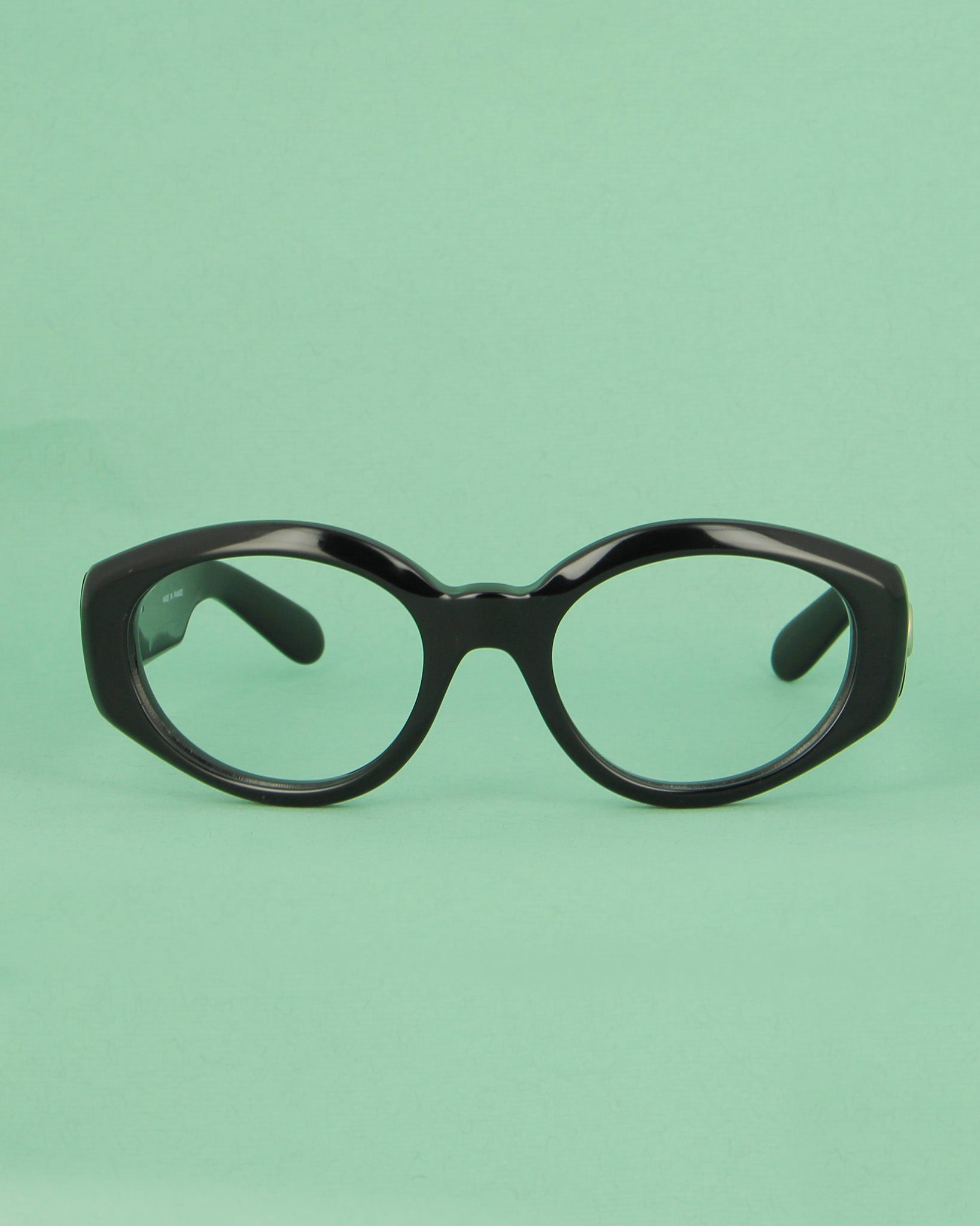 patrick-kelly-papaye-lunettes-de-soleil-ovales-noires-boutons image 1